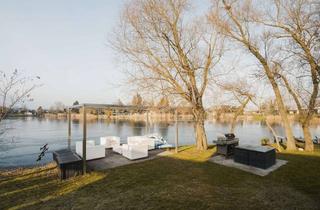 Villa kaufen in 67547 Weinsheim, Exklusives Refugium am Privatsee - Hochmoderne Designvilla im Bauhausstil!