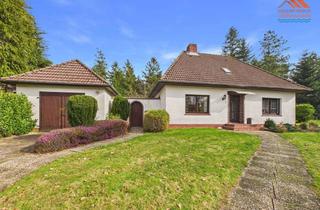 Einfamilienhaus kaufen in 21763 Neuenkirchen, Nostalgie trifft Potenzial: Freistehendes Einfamilienhaus auf großem Naturgrundstück in Neuenkirchen