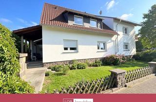 Haus kaufen in 55629 Seesbach, Wohnen am Feldrand: Großzügiges Zweifamilienhaus mit traumhaftem Grundstück