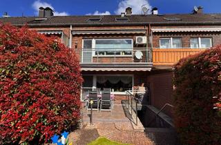 Reihenhaus kaufen in 47179 Wehofen, Charmantes Reihenhaus mit Garten und 2 Garagen in Wehofen - Nutzbar als Ein- oder Zweifamilienhaus