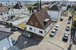 Einfamilienhaus kaufen in Hermann-Hesse-Straße, 68623 Lampertheim, Großzügiges EFH mit 7 Zimmern, Garten und Doppelgarage - vielfältige Gestaltungsmöglichkeiten