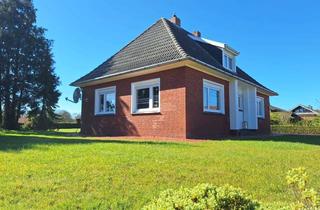 Haus kaufen in 26831 Bunde, Freistehender Bungalow – modernisiert und idyllisch gelegen