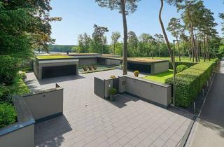 Haus kaufen in 40885 Ratingen, Moderner Designer Bungalow auf einzigartigem Seegrundstück in Ratingen Lintorf