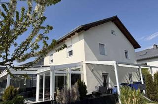Einfamilienhaus kaufen in 65366 Geisenheim, Frühlingsangebot: Einfamilienhaus mit Wintergarten und großem Grundstück