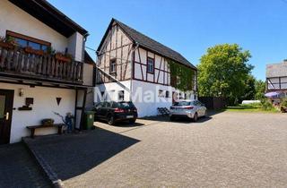 Haus kaufen in 55483 Dickenschied, 7-Zi.-Zuhause mit großem Garten inkl. zwei kleiner Nebengebäude