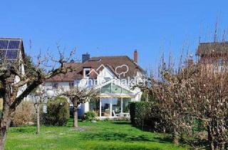 Einfamilienhaus kaufen in 65824 Schwalbach, Ansprechendes Zuhause für Gartenfans
