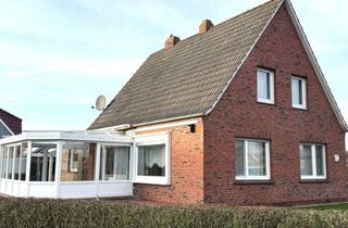 Einfamilienhaus kaufen in 26736 Krummhörn, Gepflegt und küstennah: Einfamilienhaus mit Wintergarten, Garage und Garten