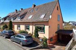 Doppelhaushälfte kaufen in 34292 Ahnatal, Ahnatal / Heckershausen - Solide Doppelhaushälfte mit Garage und wunderschönem Garten in Ahnatal-Heckershausen