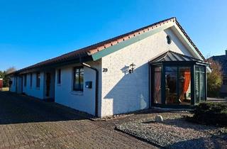 Einfamilienhaus kaufen in 27442 Gnarrenburg, Gnarrenburg - Bungalow mit Carport und idyllischem Traumgarten
