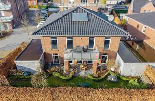 Wohnung kaufen in 26817 Rhauderfehn, Moderne Obergeschosswohnung mit Balkon in zentraler Lage !