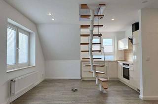 Wohnung kaufen in 25836 Garding, Charmante Dachgeschosswohnung - mit Terrasse und Garten -