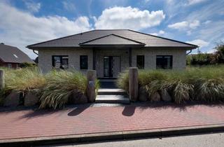 Haus kaufen in 25836 Garding, Moderner Winkelbungalow in Garding – Effizienzhaus 40 Plus mit hochwertiger Ausstattung