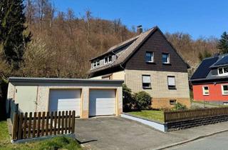 Haus kaufen in 38685 Langelsheim, Freistehendes Ein-/Zweifamilienhaus mit Doppelgarage und großen Garten