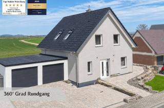 Haus kaufen in 97258 Gollhofen, Sofort bezugsbereit: Modernes KfW55E Haus A+, vollunterkellert mit Südterrasse,& Doppelgarage