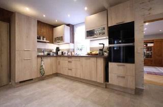 Haus kaufen in 06449 Aschersleben, Großzügiges Reihenmittelhaus mit Einliegerwohnung und Garten-Oase