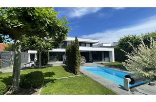 Villa kaufen in 86830 Schwabmünchen, Stadtvilla mit 428 m² Wohnfläche, Pool, Erdwärme, PV, Solar und A+ Energieeffizienz
