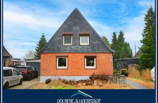 Haus kaufen in 25436 Moorrege, Gemütliches Zuhause mit Kamin und Garten in Moorrege