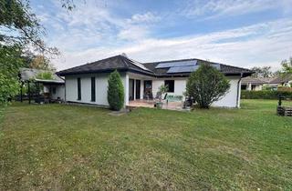 Haus kaufen in 53560 Vettelschoß, Vettelschoß - Energetisch sanierter Winkelbungalow in familienfreundlicher Wohnlage von Vettelschoß