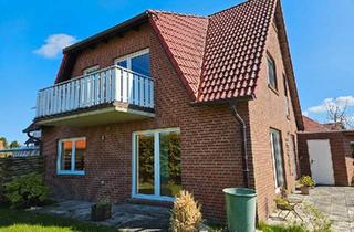 Doppelhaushälfte kaufen in 26434 Wangerland, Wangerland - Versetzte Doppelhaushälfte mit Balkon