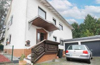 Haus kaufen in 55286 Wörrstadt, Wörrstadt - Charmantes Zwei- bis Dreifamilienhaus mit grüner Oase und hervorragender Lagequalität in Wörrstadt