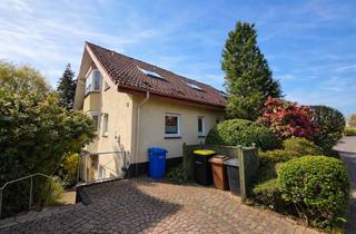 Wohnung kaufen in 63486 Bruchköbel, Wohnen am Naturschutzgebiet – stilvolle 2-Zimmer-Wohnung mit Terrasse und Kamin!
