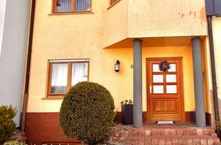 Haus kaufen in 63801 Kleinostheim, Familienhaus mit Garten, Balkon & Ausbaupotenzial – attraktive Gelegenheit in Kleinostheim