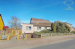 Einfamilienhaus kaufen in 06917 Jessen, Einfamilienhaus mit Einliegerwohnung und Nebengelass in Jessen (Elster) OT Holzdorf