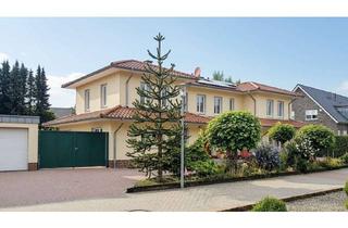 Wohnung kaufen in 49401 Damme, Komfort auf einer Ebene: Erdgeschosswohnung mit Terrasse und Doppelgarage