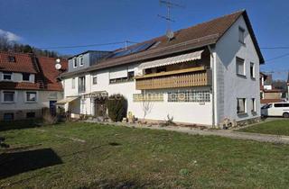 Einfamilienhaus kaufen in 72654 Neckartenzlingen, Ausbaupotential vorhanden: Einfamilienhaus in Grenzbauweise, 3 Garagen und Garten