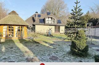 Einfamilienhaus kaufen in 28816 Stuhr, Stuhr - Charmantes EFH mit viel Platz & Wintergarten im Grünen