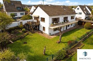 Einfamilienhaus kaufen in 55450 Langenlonsheim, Langenlonsheim - Einfamilienhaus mit zwei Balkonen, Terrasse, Garten, Garage und Werkstatt in Langenlonsheim