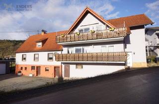 Einfamilienhaus kaufen in 54516 Flußbach, Flußbach - Gepflegtes 3-Familienhaus mit Garagen, Garten und hervorragenden Mieteinnahmen