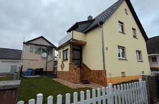 Einfamilienhaus kaufen in 35641 Schöffengrund, Schöffengrund - Vermietetes Renditeobjekt charmantes Einfamilienhaus