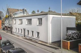 Mehrfamilienhaus kaufen in 52477 Alsdorf, Alsdorf - Vermietetes 4-Parteienhaus mit Garten und Garage