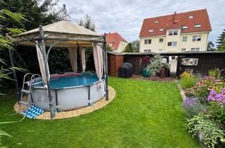 Wohnung kaufen in 06449 Aschersleben, Erfrischung inklusive: 3-Raumwohnung mit Garten und Carport