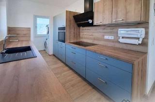 Wohnung kaufen in 96193 Wachenroth, Exklusive KfW-55-Wohnung mit Aufzug, Wintergarten und offenem Wohnkonzept