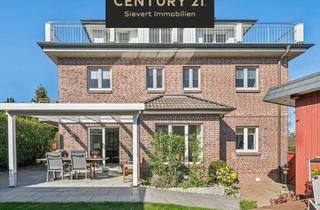 Wohnung kaufen in 21629 Neu Wulmstorf, Luxuriöse Erdgeschosswohnung mit Einfamilienhauscharakter & Gartenparadies in Bestlage