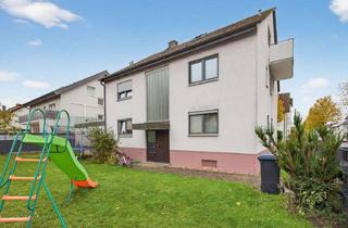 Wohnung kaufen in 76149 Neureut, Helle Erdgeschoss-Wohnung mit Gartenanteil un Duplex-Stellplatz