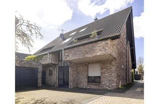 Wohnung kaufen in 41469 Neuss, Großzügige Maisonettewohnung mit Terrasse und Garten in Hoisten