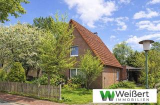 Einfamilienhaus kaufen in 25774 Lehe, 4,5-Zimmer-Einfamilienhaus mit Garage auf großzügigem 803 m² Grundstück in Lehe