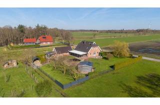 Einfamilienhaus kaufen in 26629 Großefehn, Wohnen mit Weitblick - modernes Einfamilienhaus mit hochwertiger Ausstattung