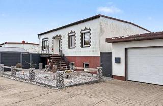 Einfamilienhaus kaufen in 17153 Stavenhagen, Gepflegtes Einfamilienhaus mit Einliegerwohnung, Garten und Garage am Rande von Stavenhagen