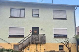 Einfamilienhaus kaufen in 97514 Oberaurach, Charmantes Einfamilienhaus mit Potenzial in Oberaurach
