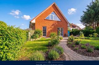 Haus kaufen in Rotdornweg 15, 18556 Wiek, Nachhaltig & Strandnah: Massivhaus, verklinkert auf 1.015 m² Grundstück mit PV, Sauna und Kamin!