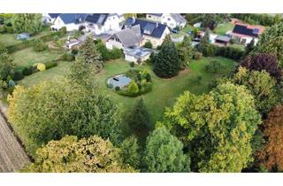 Haus kaufen in 59505 Bad Sassendorf, Wohnen wie im Park:Großzügiges 2-Familienhaus mit traumhaftem Gartenin Bad Sassendorf-Ostinghaus