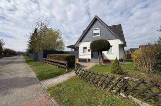 Einfamilienhaus kaufen in 27419 Sittensen, Volksbank Immobilien: Familienidylle trifft Renditechance: Einfamilienhaus mit Garten & Baupotenzial