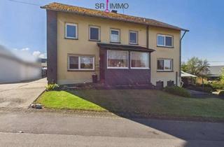 Haus kaufen in 54673 Krautscheid, Gepflegtes Wohnhaus mit großen Garagen in ruhiger Lage in Krautscheid