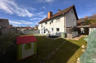 Haus kaufen in 85591 Vaterstetten, Freistehendes Zweifamilienhaus mit großem Garten in ruhiger Lage