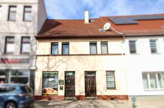 Einfamilienhaus kaufen in 39240 Calbe, VB: Charmantes Einfamilienhaus mit zusätzlicher Einnahmequelle durch Gewerbeeinheit