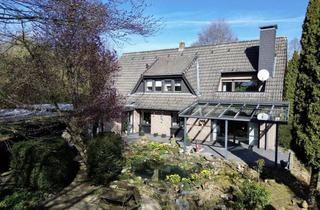 Haus kaufen in 49835 Wietmarschen, Gepflegtes Zweifamilienhaus mit großem Südgrundstück